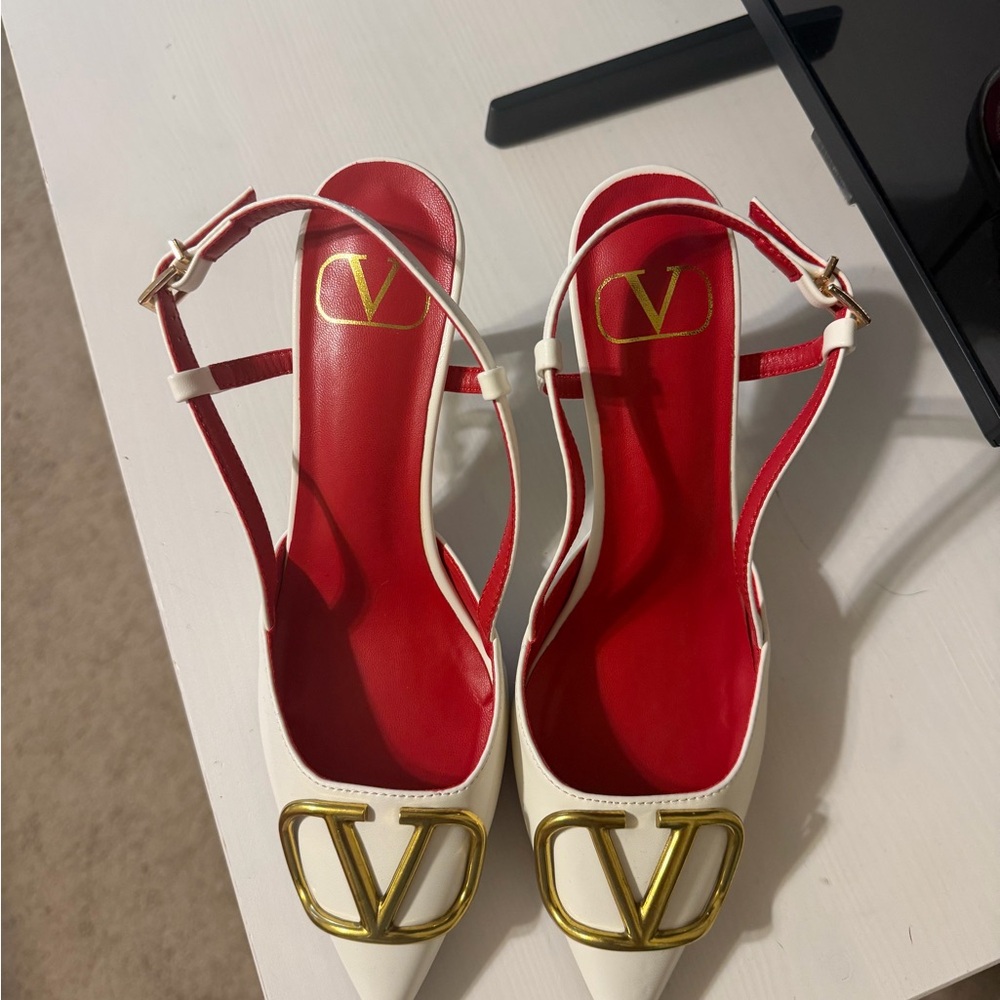 Elegant Red and White Heels with Gold Accents